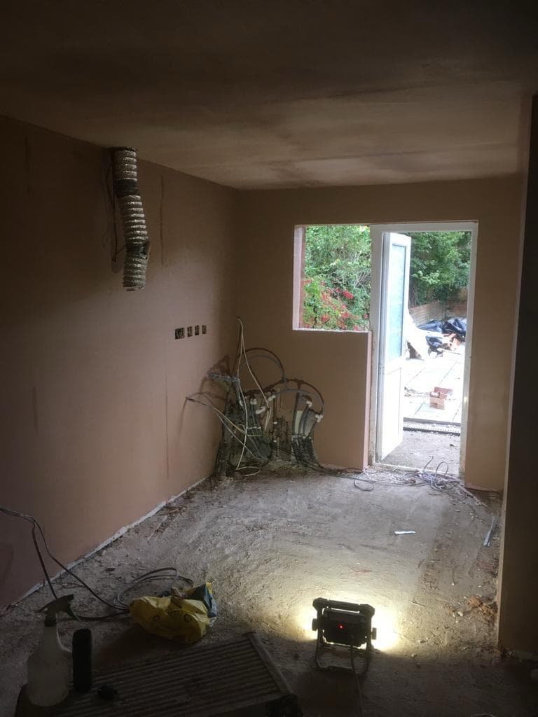 Utility room renovation with plastering and wiring by BBBrotherBuilding