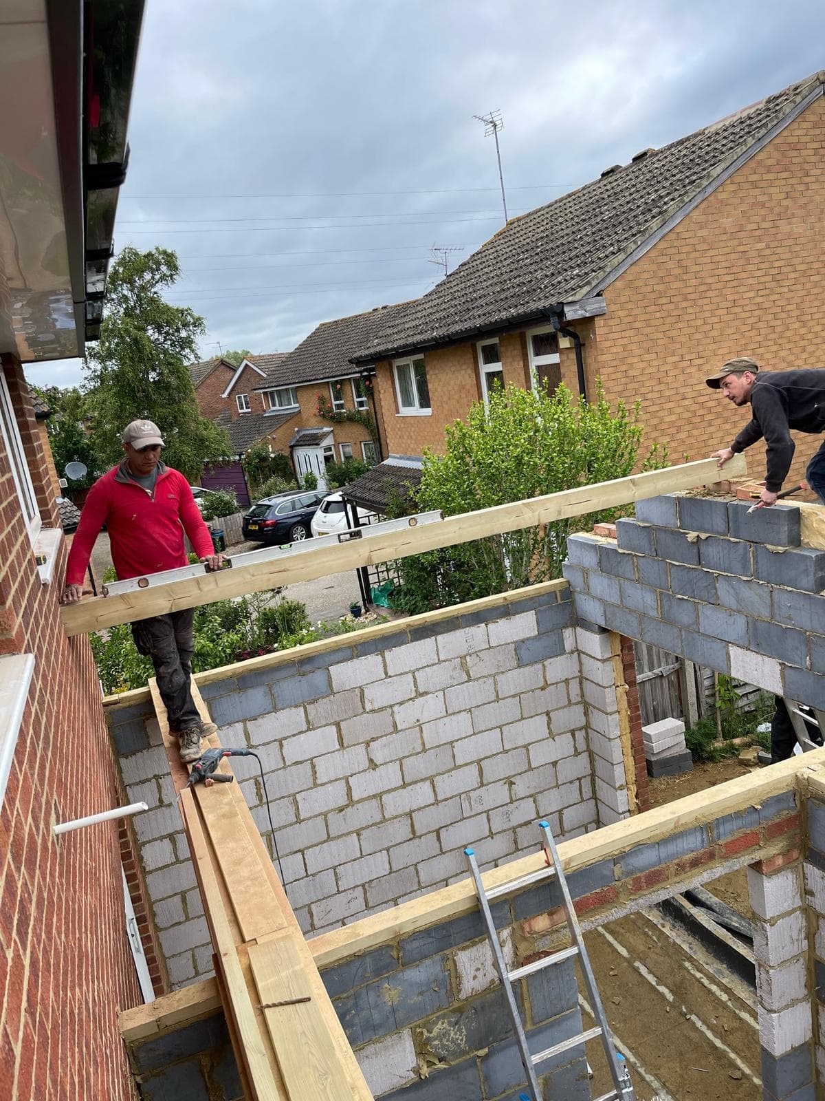 Wide view of extension brickwork and roof line by BBBrotherBuilding